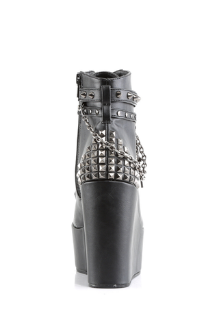 Demonia Poison-101 back view black wedge boot with studs and chain