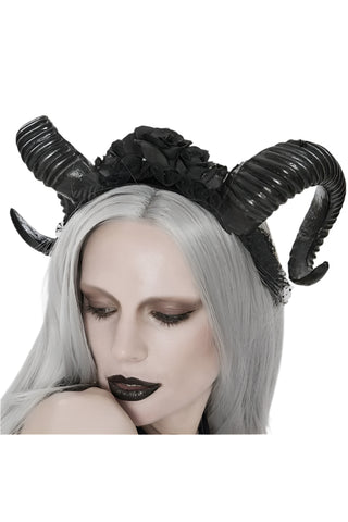 Woman wearing Lilith Horn Headdress devil fashion eas010 with eyes closed, showing curved devil horns and floral lace