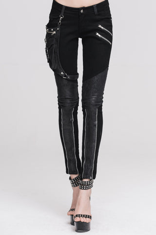 Devil Fashion PT01801 women’s black skinny trousers with detachable pocket bag, zipper accents, and textured panels, photographed against a white background.