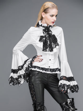 White Victorian Gothic blouse with black lace trim, detachable jabot with rose detail, and dramatic bell sleeves, worn with black lace-up trousers.