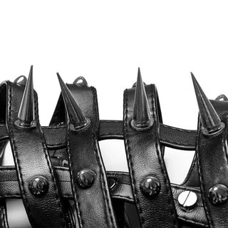 Close-up of top spikes and studding on black cage mask