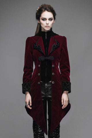 Victorian-style red velvet coat with black lapels and ornamental buttons, full-body front standing pose.