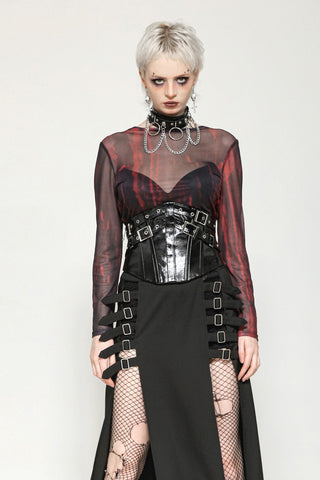 Cybergoth outfit with black corset, mesh top, strapped skirt and fishnet stockings