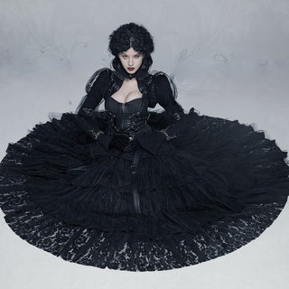 Woman wearing dramatic black Gothic formal ball gown with lace skirt and corset bodice, styled for evening or masquerade events