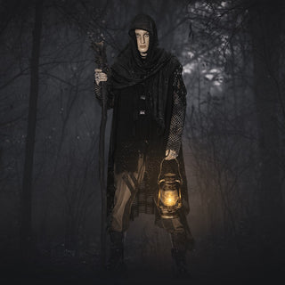 Gothic man in hooded cloak holding a lantern in a dark forest, Halloween costume aesthetic