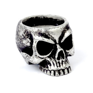 Antique silver skull tea light holder shown empty on a white background