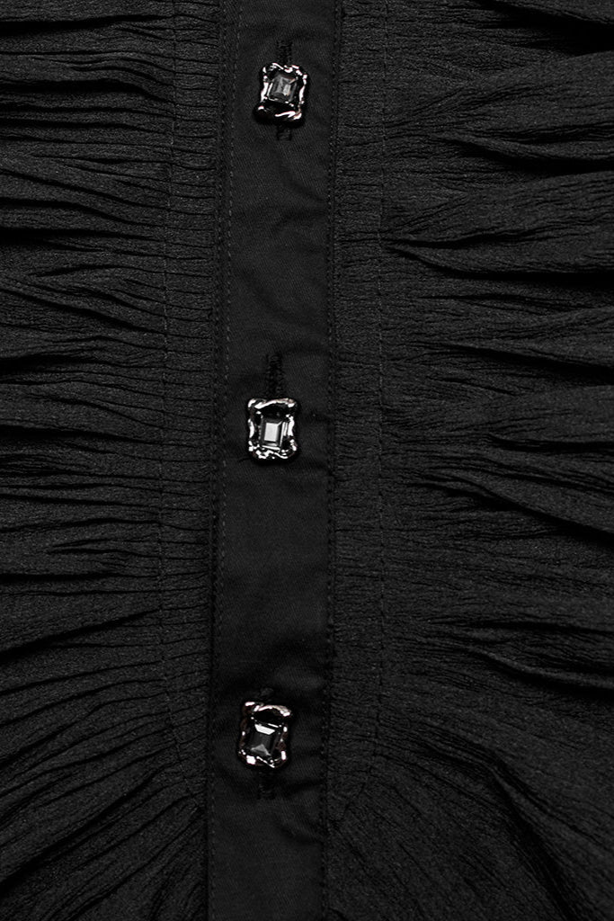 Close-up of The Aramis Shirt – pleated ruffle bib and gemstone-style buttons on black lace Gothic shirt