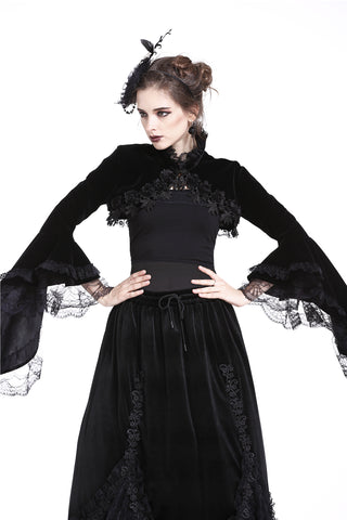 Gothic bolero styled with lace maxi skirt, model with dramatic pose