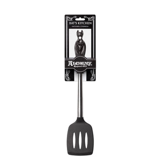 Black bat slotted spatula displayed on recyclable Alchemy Bat’s Kitchen packaging