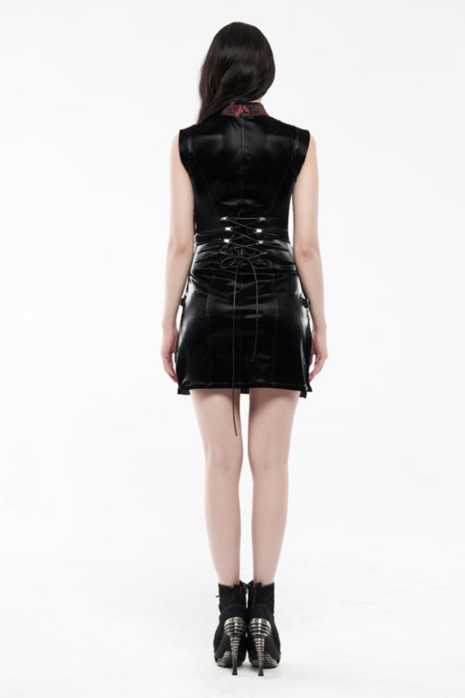 Model with long hair showing the back view of a red and black cyberpunk mini dress with satin panel and lace-up corset detail