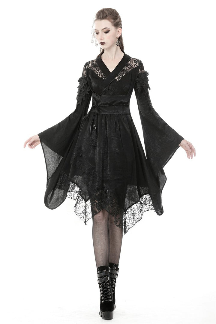 Side view of DW380 dress showing dramatic bell sleeves and lace trim