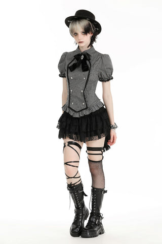 Model wearing a black-and-grey striped puff-sleeve blouse, black lace mini skirt, fishnet stockings, and knee-high platform boots, standing against a white background.