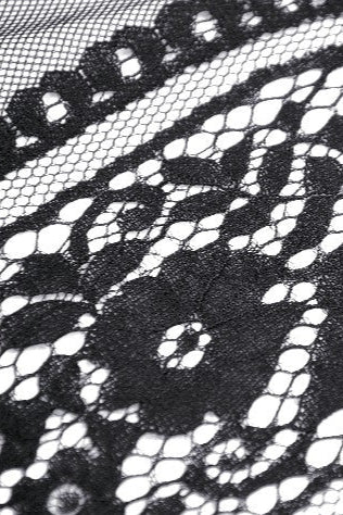 Close-up of embroidered black lace from Gothic dress hem