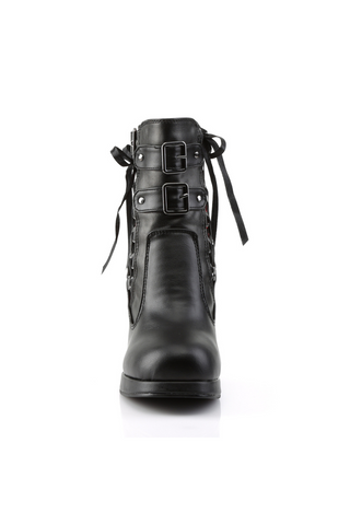Front view of Demonia Crypto-51 ankle boot showing double buckle straps, smooth black toe, and side ribbon lacing detail