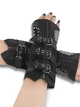 Demonia Da-457 black faux leather arm guards with triple buckle straps, metal stud accents, and decorative zippers, displayed on crossed hands against a white background.
