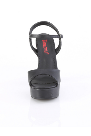 Front view of Demonia Dolly-09 black matte platform sandal with peep-toe opening, ankle strap, and chunky flared heel