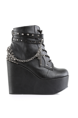 Demonia Poison-101 black wedge boot side view with chains, studs and cross charm