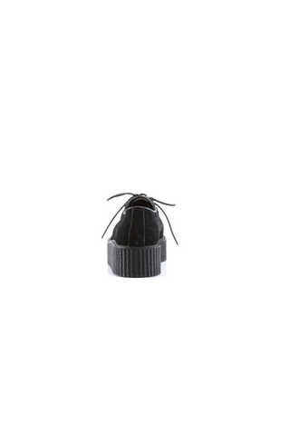Rear view of black suede creeper shoe with thick ribbed sole, shown on a white background.