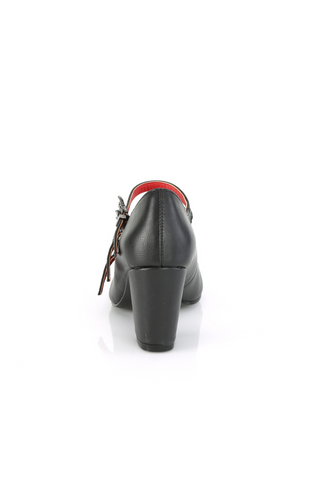 Rear view of black Mary Jane-style block heel with triple bat-buckle straps and red interior lining, on a white background.