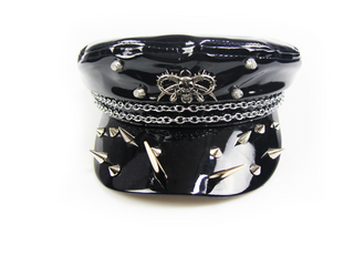 Black patent studded chain cap with spikes front view on white background
