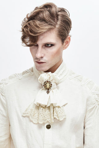 Men’s gothic ivory lace jabot cravat with cameo brooch worn with high collar shirt