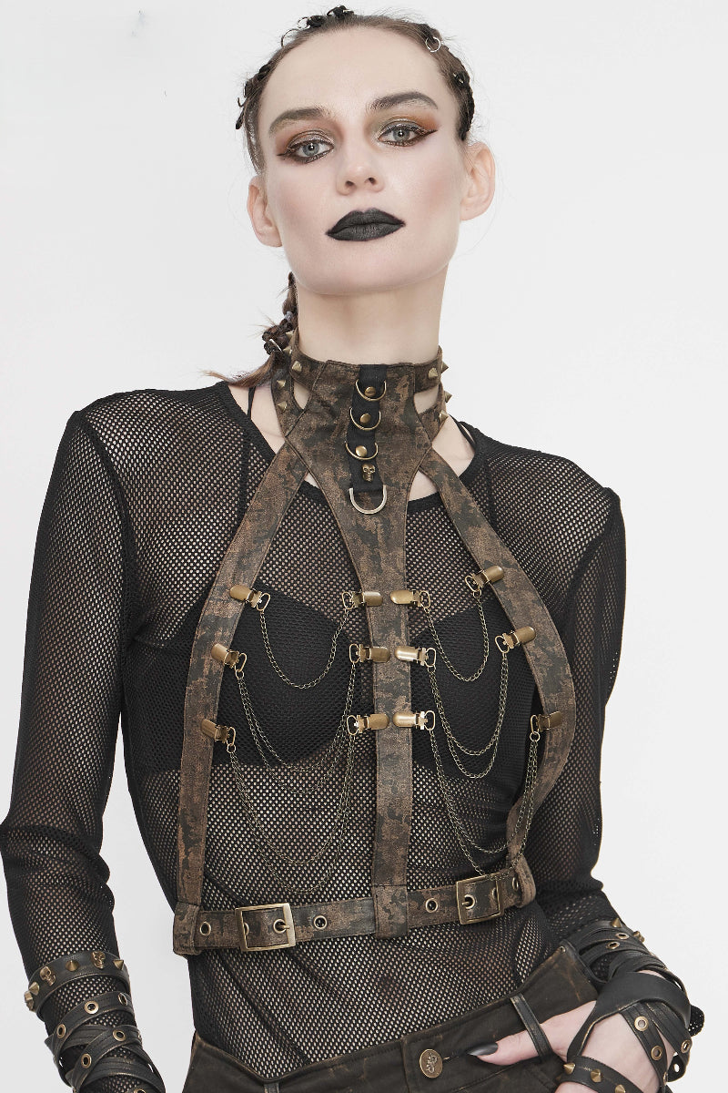 Woman wearing devil fashion as065 Steampunk body harness with chains and buckles over black mesh top