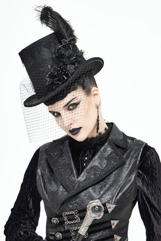 Victorian gothic black top hat with feather, lace detail, and face veil worn by model in dark outfit