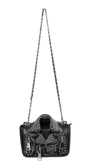 Studded punk rock biker jacket handbag with oversized zip details, silver hardware and chain shoulder strap on white background.