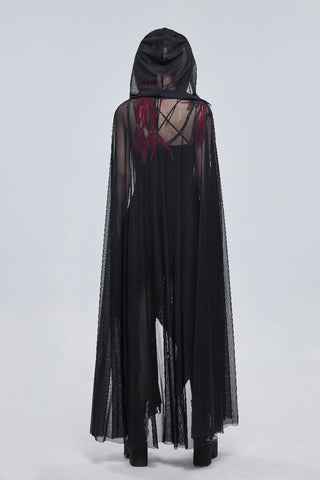 Back view of a woman in a sheer black hooded cape, showing red streaks in her hair and platform boots, against a white background.