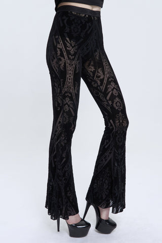 Side view of Devil Fashion PT192 black velvet baroque flare pants with semi-sheer gothic pattern and bell-bottom legs