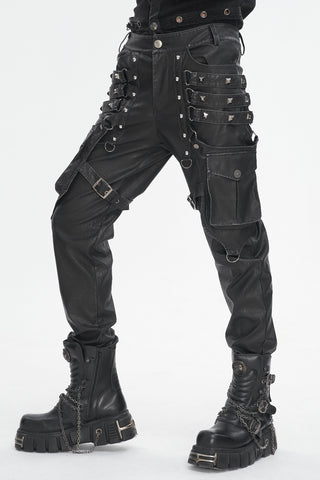 Model wearing Devil Fashion PT24401 Gothic faux leather pants with pyramid studs, buckled leg strap, and side cargo pocket on white background