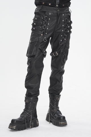 Model wearing Devil Fashion PT24401 Gothic techwear pants with pyramid studs, buckles, and cargo pockets on white background
