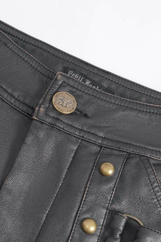 Close-up of Devil Fashion PT24402 with gold button and vintage stitching