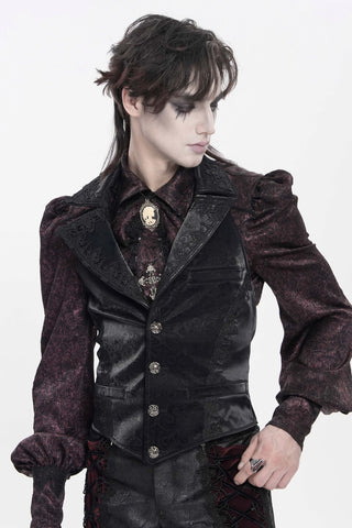 Man wearing The Velvet  aristocrat Gothic vest with embossed black jacquard fabric, lace trim, ornate buttons, and halterneck design