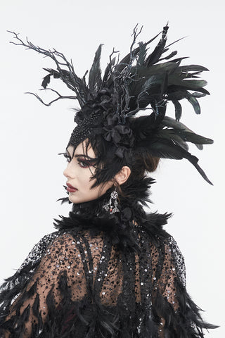 Black feather headpiece shown on mannequin, side profile view, white background.