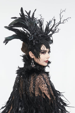 Right-side view of black feather headdress with branch accents, worn on mannequin against white background.