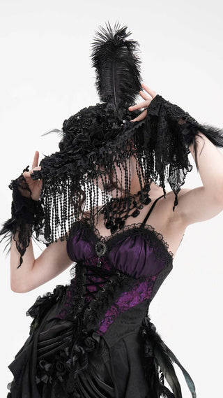 Model wearing Eva Lady EAS019 Victorian Gothic wide-brim hat with cascading beaded fringe, feather plume, and lace embellishments, styled with a black and purple corset dress.