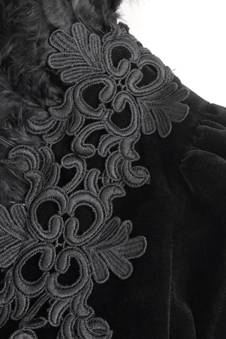 Close-up of embroidered lace and feather trim on collar of Eva Lady ECT015 black velvet bolero jacket