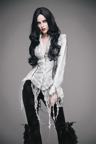 Woman wearing a white Romantic Gothic lace blouse with distressed lace hem and fitted silhouette