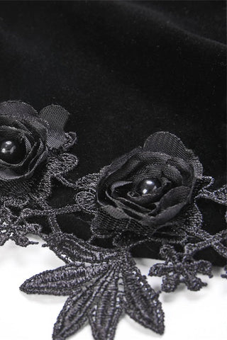 Close-up of floral embroidery and 3D fabric roses on Gothic bolero
