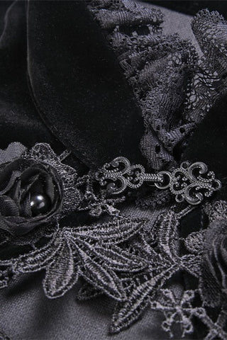 Layered black lace and trim on flared sleeve cuff