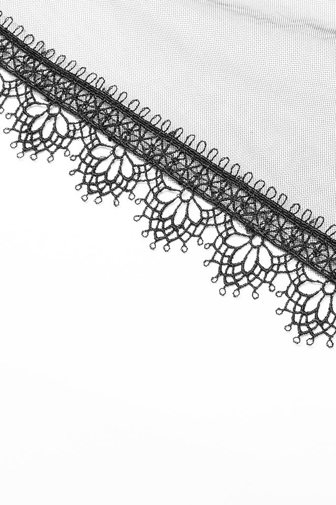 Close-up of mesh hem with lace trim on Gothic dress