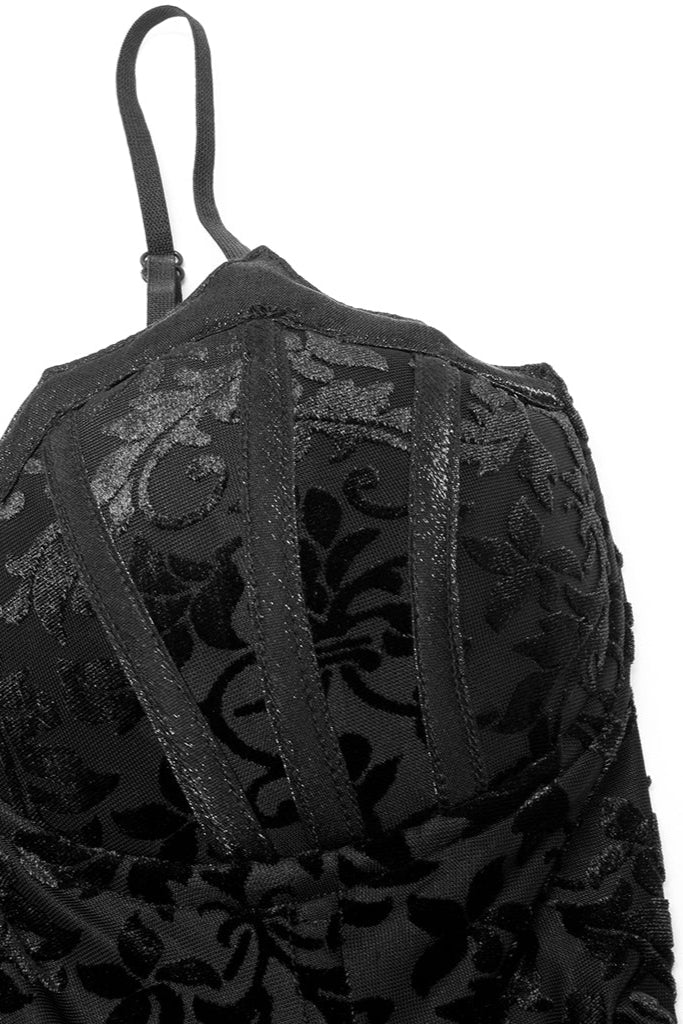 Detailed close-up of velvet floral bodice on black Gothic dress