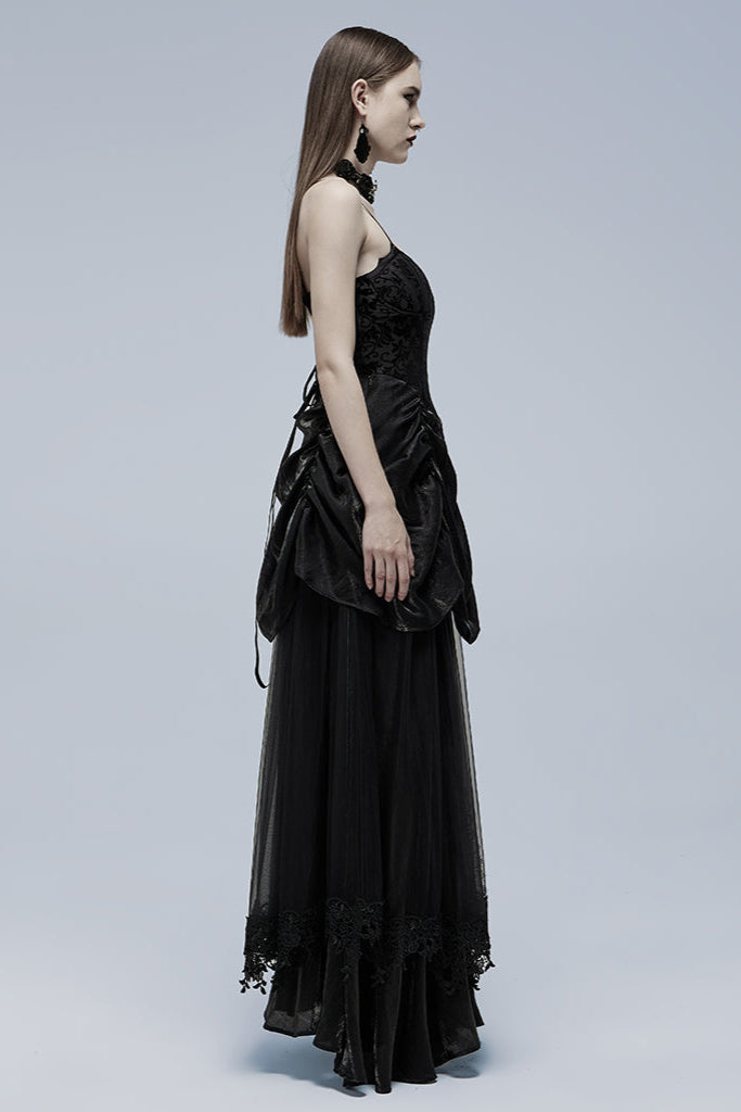 Side view of model in black Gothic lace dress