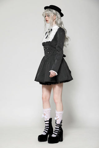 Side angle showing the dress’s structured skirt and silhouette