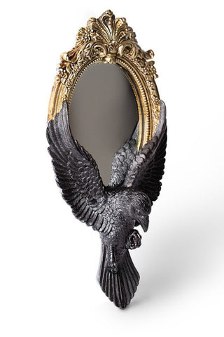 Side view of Gothic raven hand mirror with black wings and antique gold baroque frame