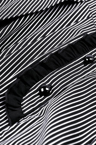 Close-up of pinstripe fabric and front buttons