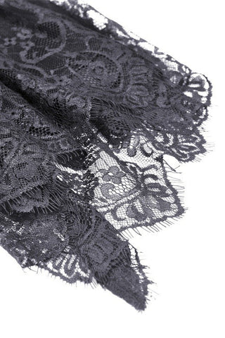 Close-up of sheer lace layered sleeve with ruffle cuff on Gothic dress