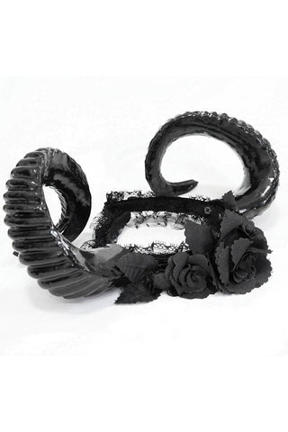 Lilith Horn Headdress laid flat, showing coiled horns and detailed black roses