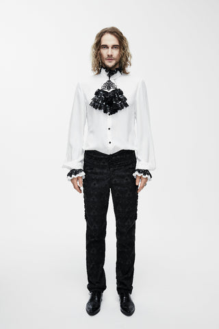 Full-body view of man wearing white Gothic shirt with black lace jabot and fitted black velvet trousers